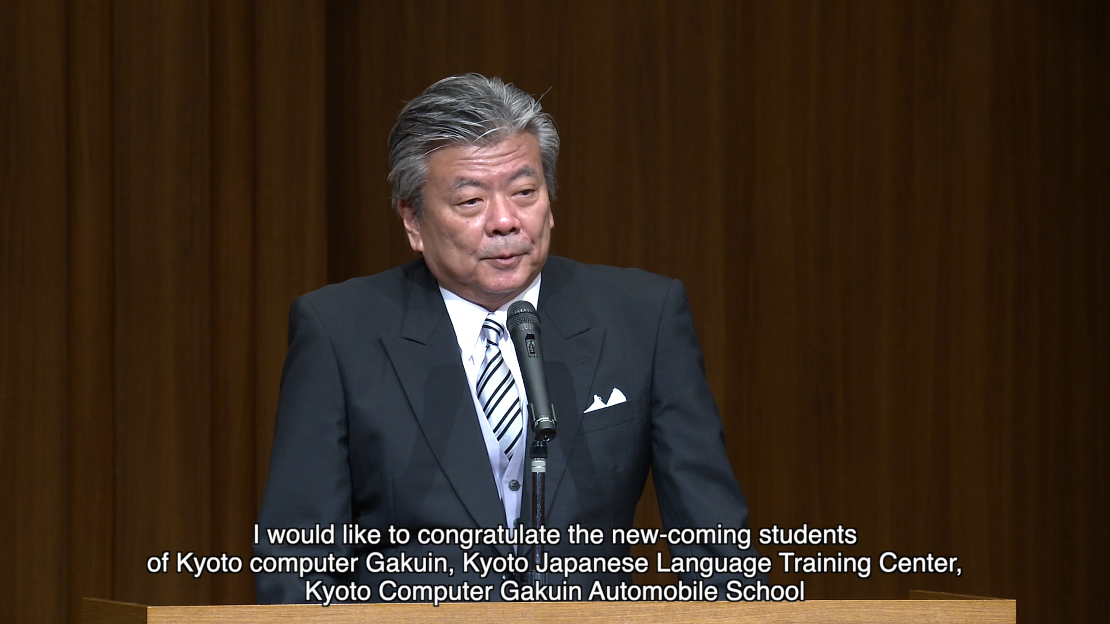 KCG集团监事会主席Wataru Hasegawa通过视频流发表仪式讲话。